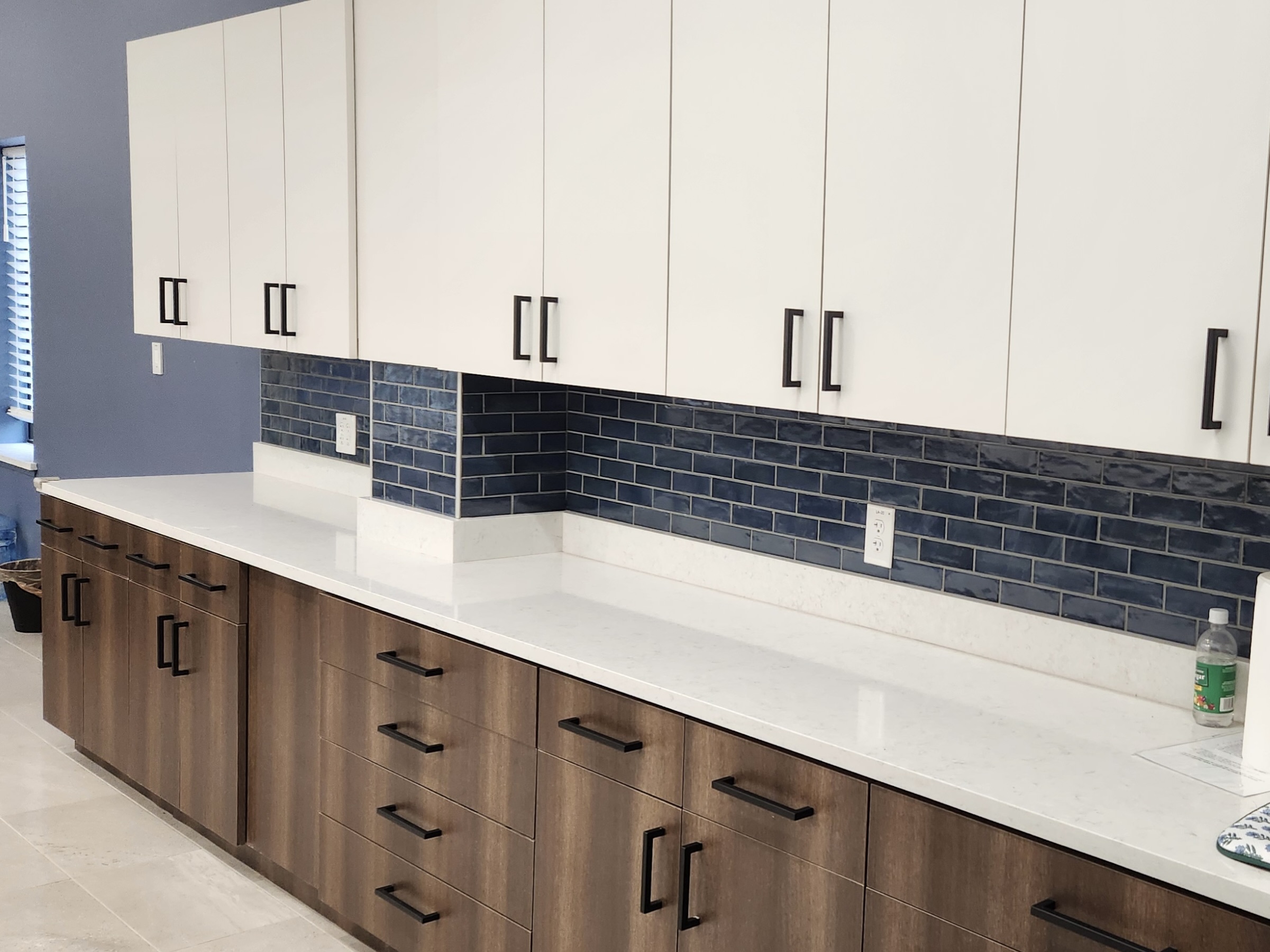 custom cabinetry for this kitchen and beautiful tile work.